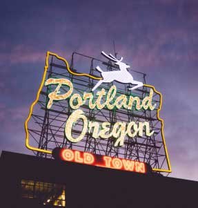 neon sign with stag that reads "Portland Oregon"